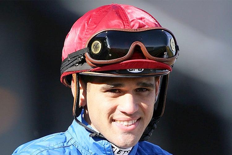Horse racing action with jockeys in competition