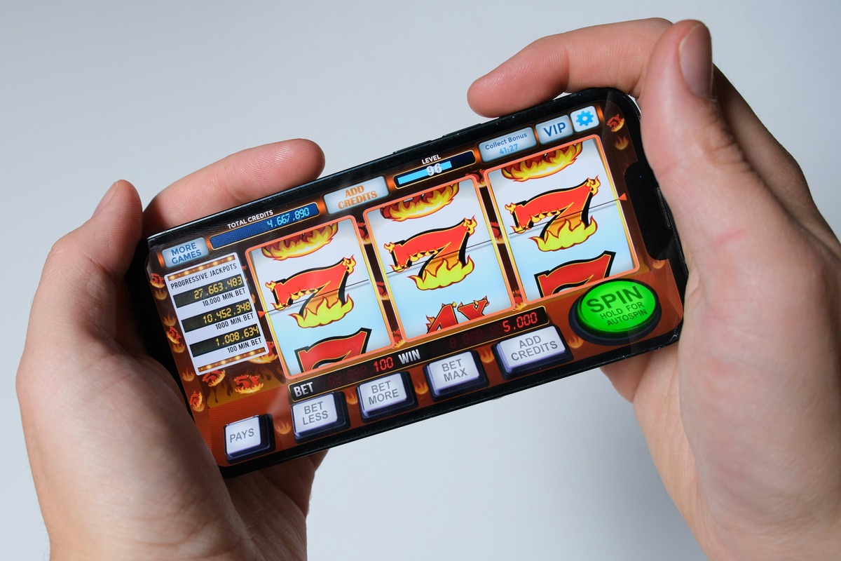 Modern casino interior with colourful lighting and slot machines